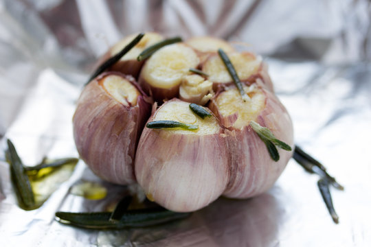 Close up of fresh garlic bulb ready for roast