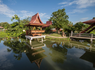 Naklejka premium Traditional Thai wooden on the lake