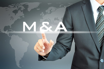 Businessman hand touching M & A or merger & acquisition 
