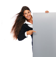 Business woman happy cheerful smiling presenting empty sign