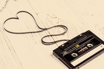 audio cassette with magnetic tape in shape of heart