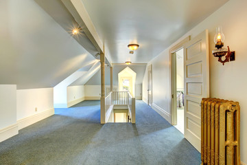 Empty upstairs room with staircase