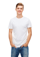 smiling young man in blank white t-shirt