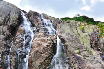 Fototapeta na wymiar Waterfall in Tatra, mountains in Poland