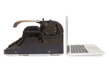 Modern Laptop and old Typewriter