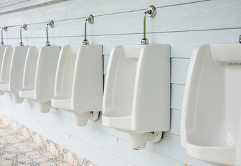 urinals in toilet.