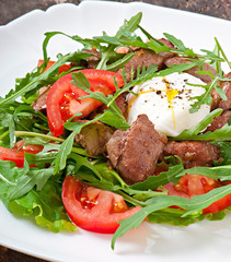 Mixed salad with chicken liver and egg Pochet