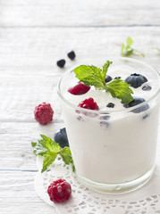 Fototapeta na wymiar Cream with fresh berries