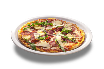 Pizza with cheese, salami and  herbs