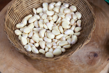 Organic garlic in a straw basket