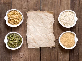 Selbstklebende Fototapeten Raw Organic Amaranth and quinoa grains, wheat and mung beans © katrinshine