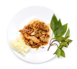 Thai cuisine spicy pork salad , Moo Nam Tok isolated white backg