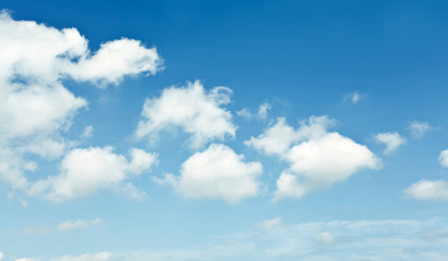 Naklejka na ściany i meble beautiful sparse clouds in the blue sky
