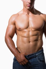 Fototapeta premium Mid section of a shirtless muscular man