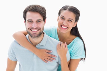 Fototapeta premium Cute couple smiling at camera