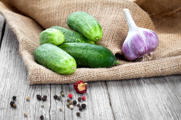 cucumbers on the wooden background