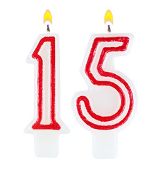 Birthday candles number fifteen isolated on white background