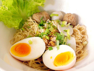 Thai noodle soup with pork ball and egg