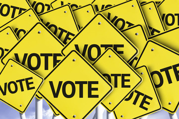 Vote written on multiple road sign