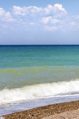 sea, sky with clouds, waves and beach