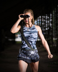 Woman in uniform with binoculars (dark version)