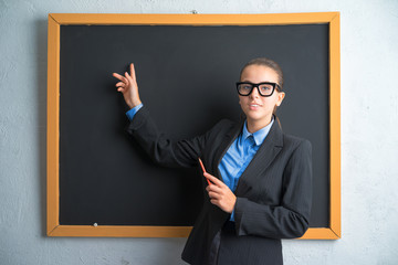 student at the blackboard