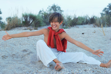 Happy boy on the beach