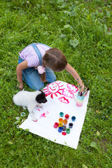 two friends-  little  girl and puppy