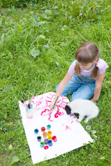 two friends-  little  girl and puppy