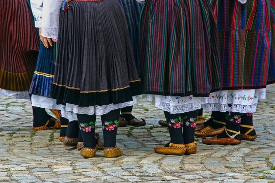Women wearing traditional bulgarian clothes and shoes