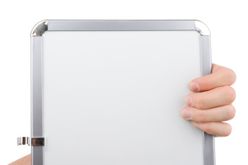 Hand holding an empty whiteboard (magnetic board) isolated