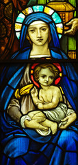 Fototapeta premium Mary with child Jesus in stained glass