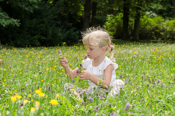 blond girl on grass
