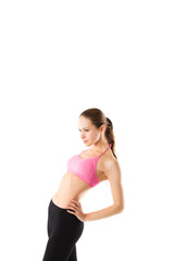 Fototapeta premium Young sexy athletic woman in sportswear isolated