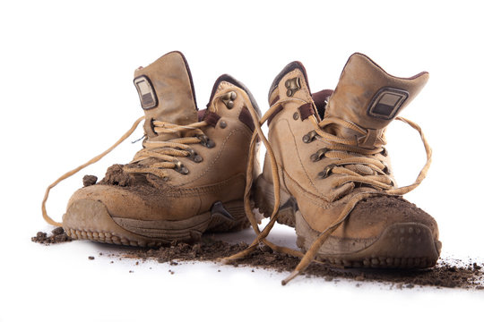 an old boots covered with soil