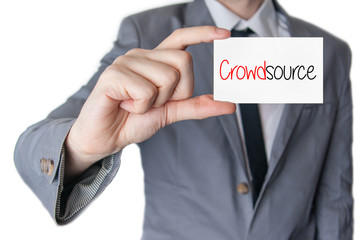 Crowdsource. Businessman holding business card