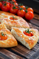 Focaccia with cherry tomatoes, rosemary and sea salt