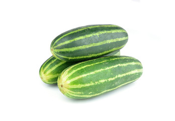 Healthy food. The green cucumbers isolated on white background