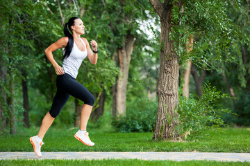 Young woman jogging in nature