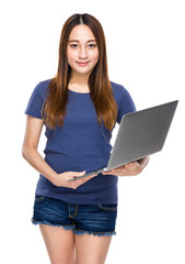 Mixed race young woman use notebook computer