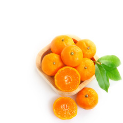 Top view of ripe orange fruits on white
