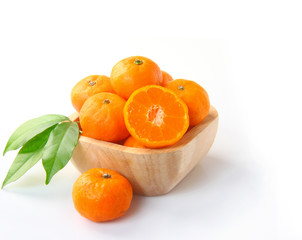 Ripe orange fruits on white background