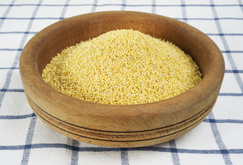 millet in a wooden bowl