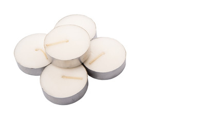 Small tealights over white background