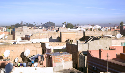 Marrakesh rooftops on a background Atlas Mountains