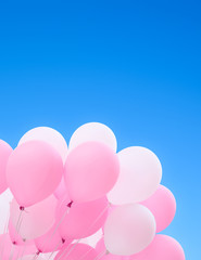 Fototapeta na wymiar festive balloons against the blue sky