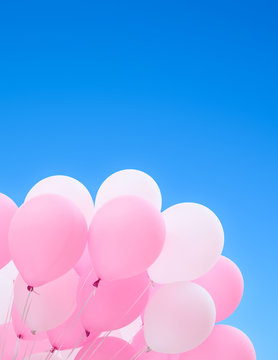 festive balloons against the blue sky