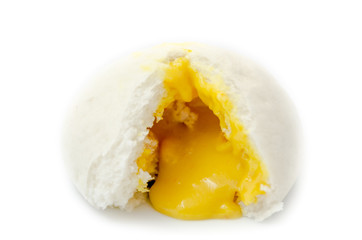 Chinese steamed bun show its yellow cream isolated on white back