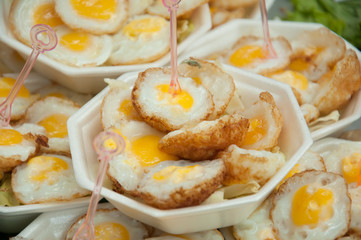little fried egg on white dish
