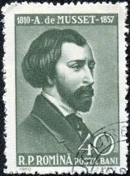 stamp printed in Romania shows Alfred de Musset